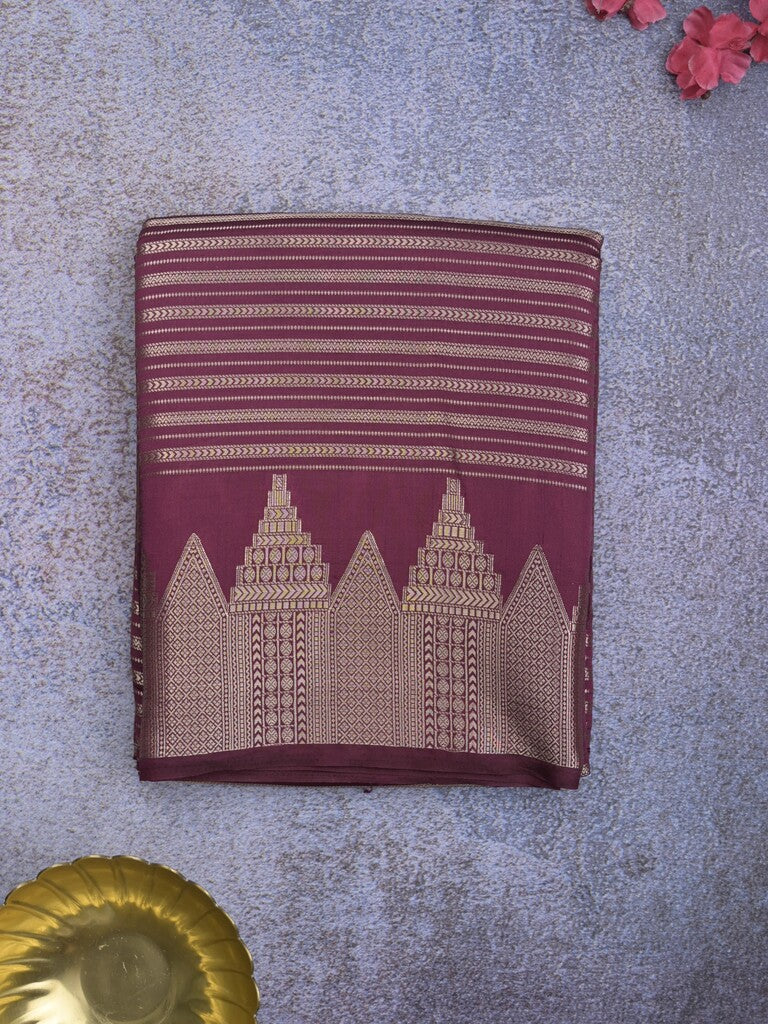 green silk paisley print saree with gold border