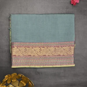 green silk paisley print saree with gold border